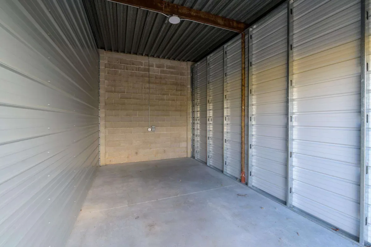 Interiror view of drive up self storage unit with electrial outlet