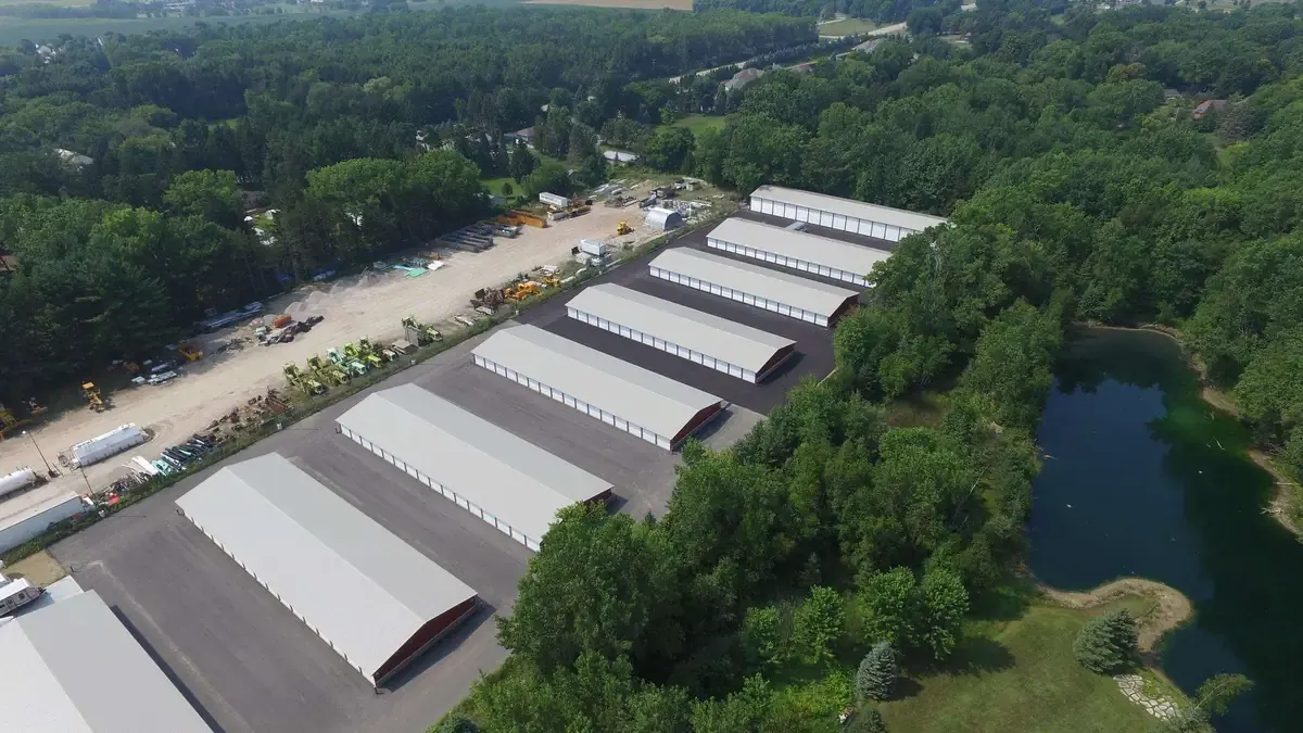 Multiple drive up self storage buildings with wide lanes
