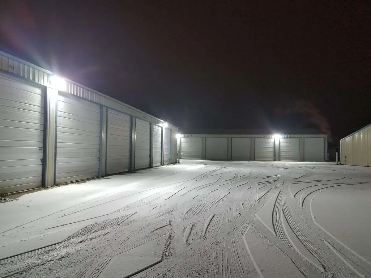 Well lit self storage facility at night