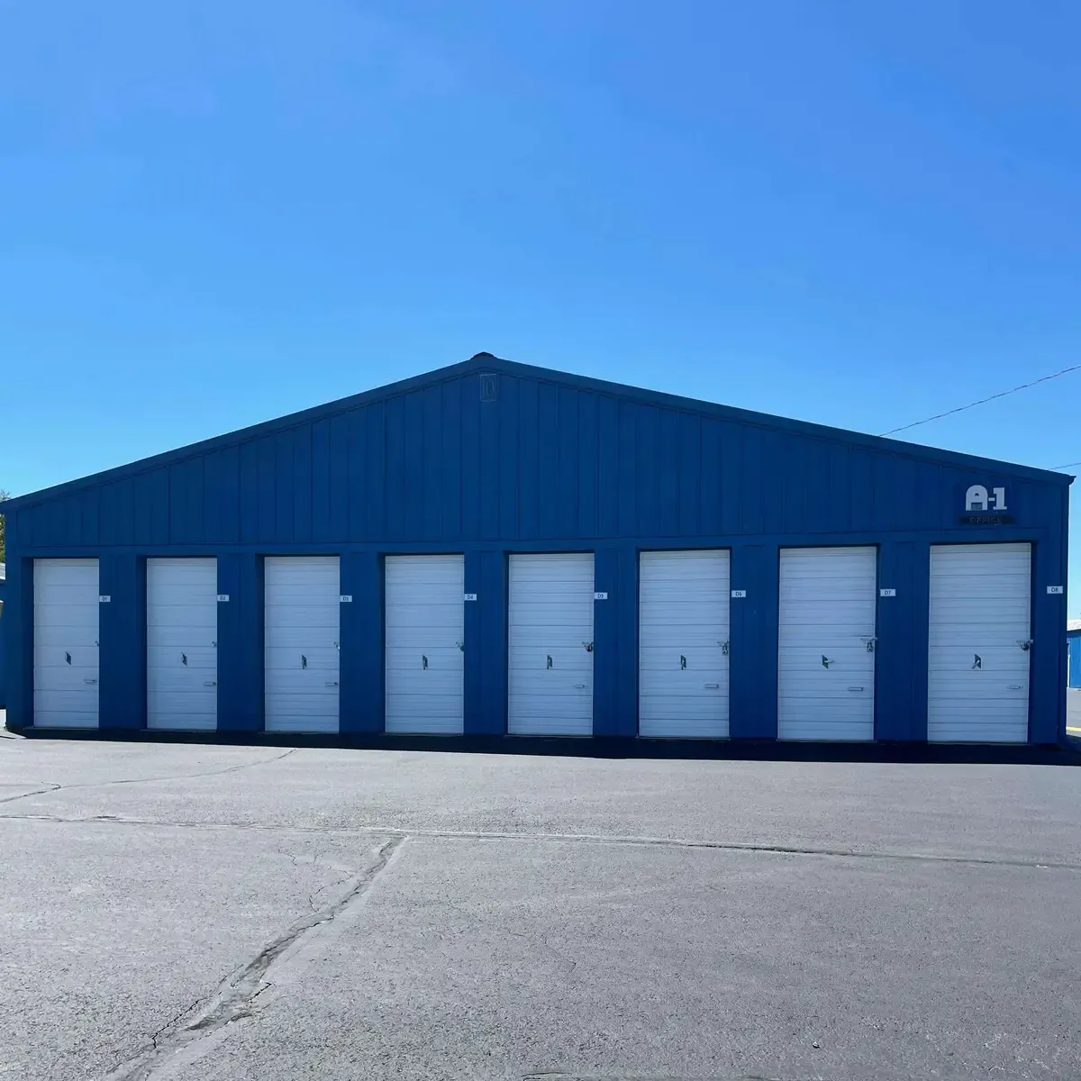 drive up storage unit in a blue building