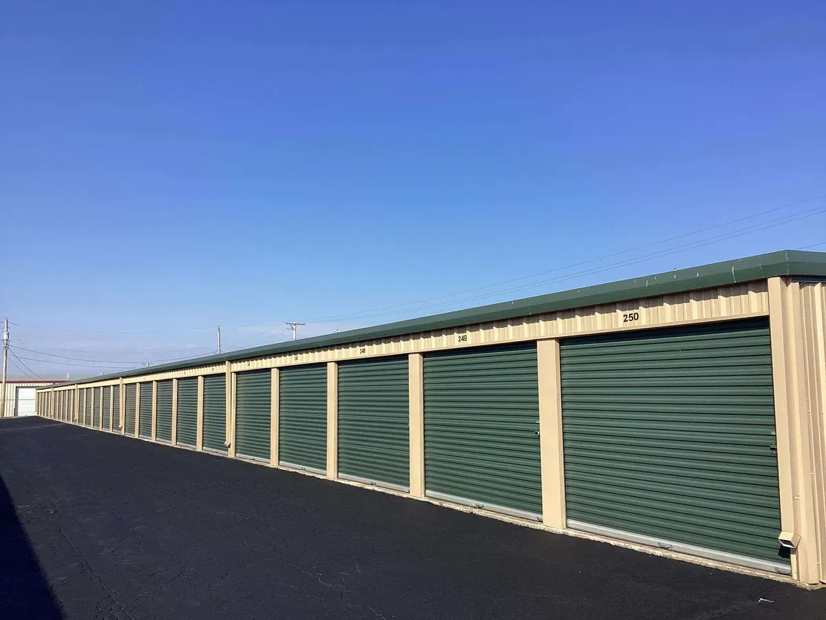 drive up storage unit with green doors unit number 250