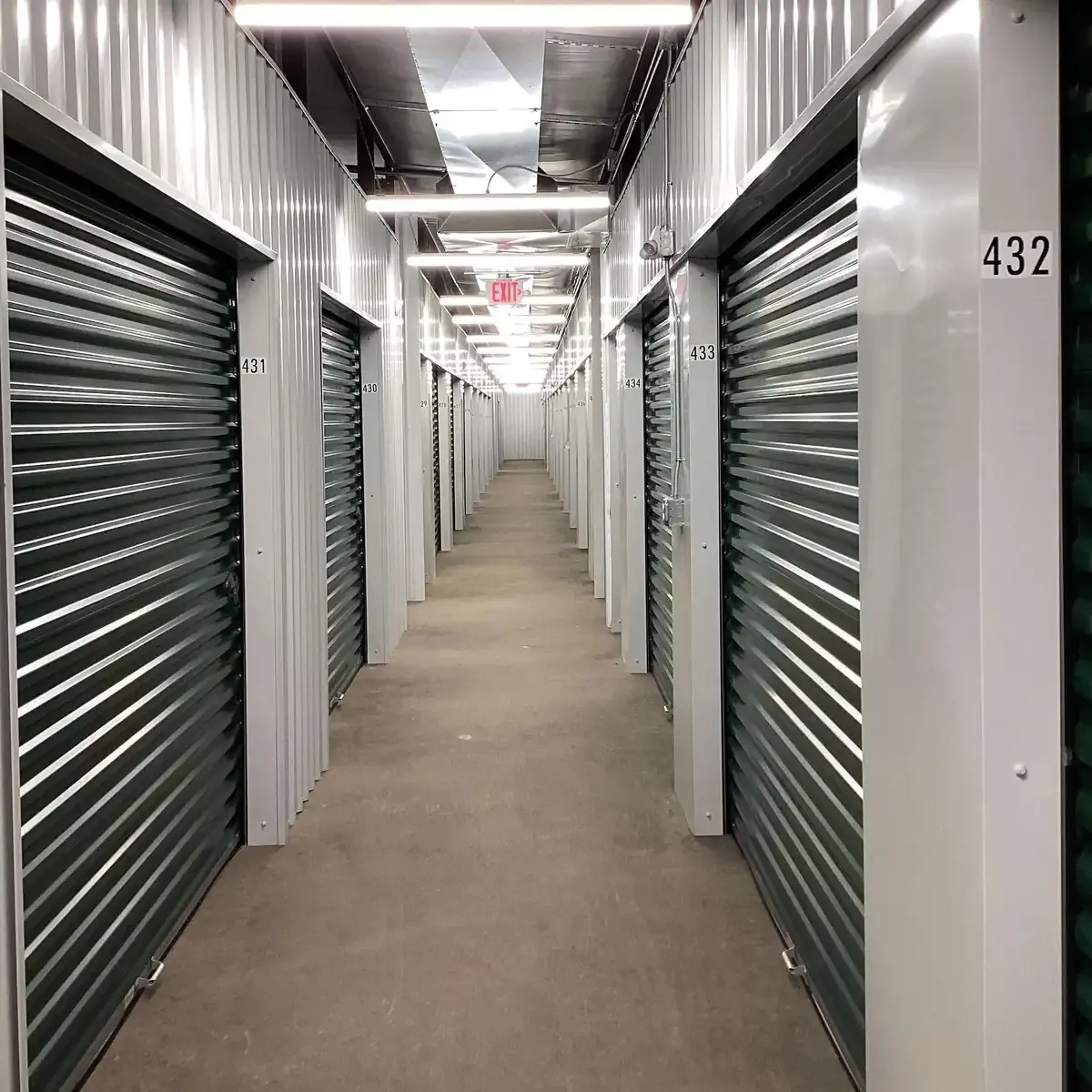 interior of storage facility with green doors